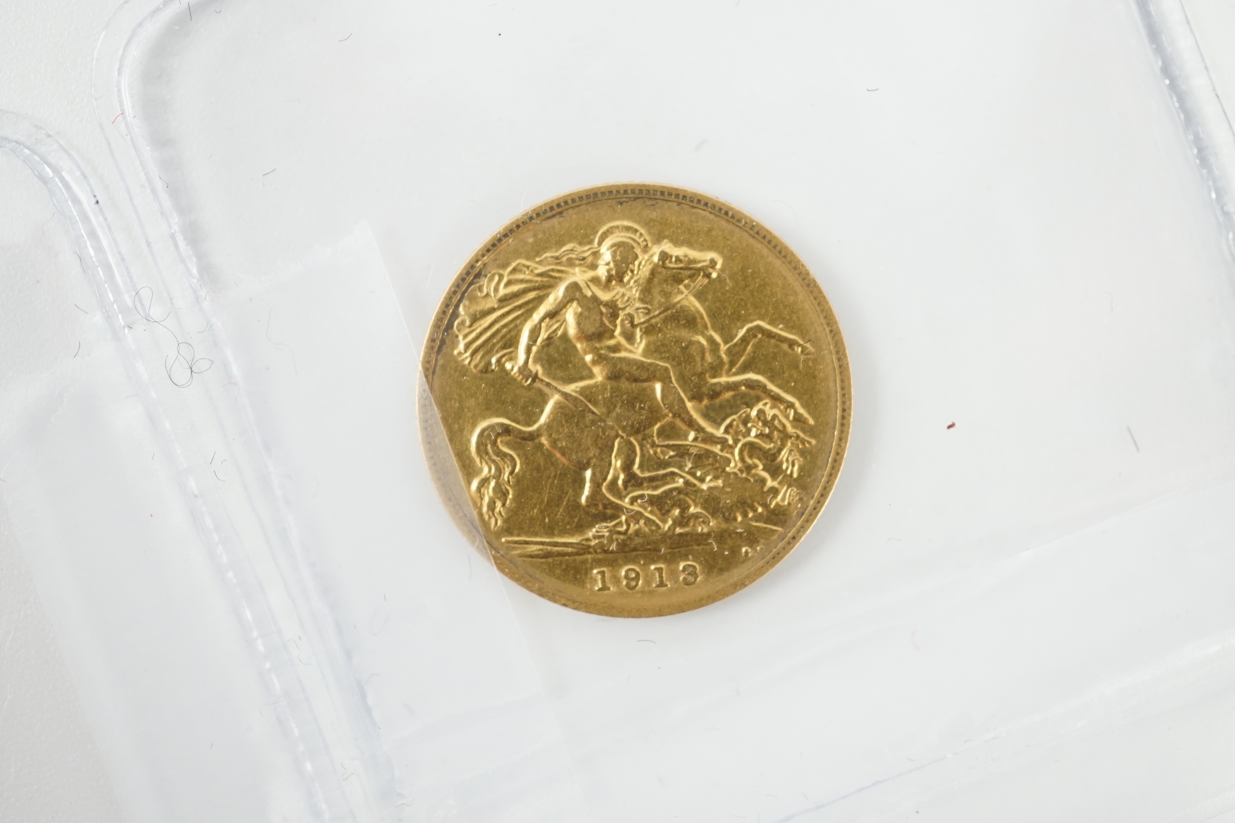 Two gold sovereigns, Victoria 1898M and Edward VII 1910, a George V half sovereign 1913 and a France gold 10 francs 1900 (test mark to portrait).